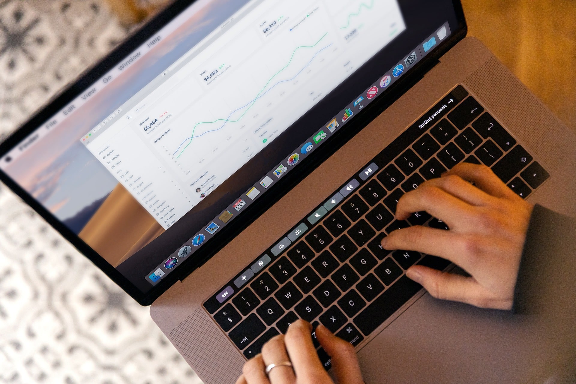 An executive reviewing the four zones of board dynamics on a laptop for the ebersmith coaching & consulting board diagnostic